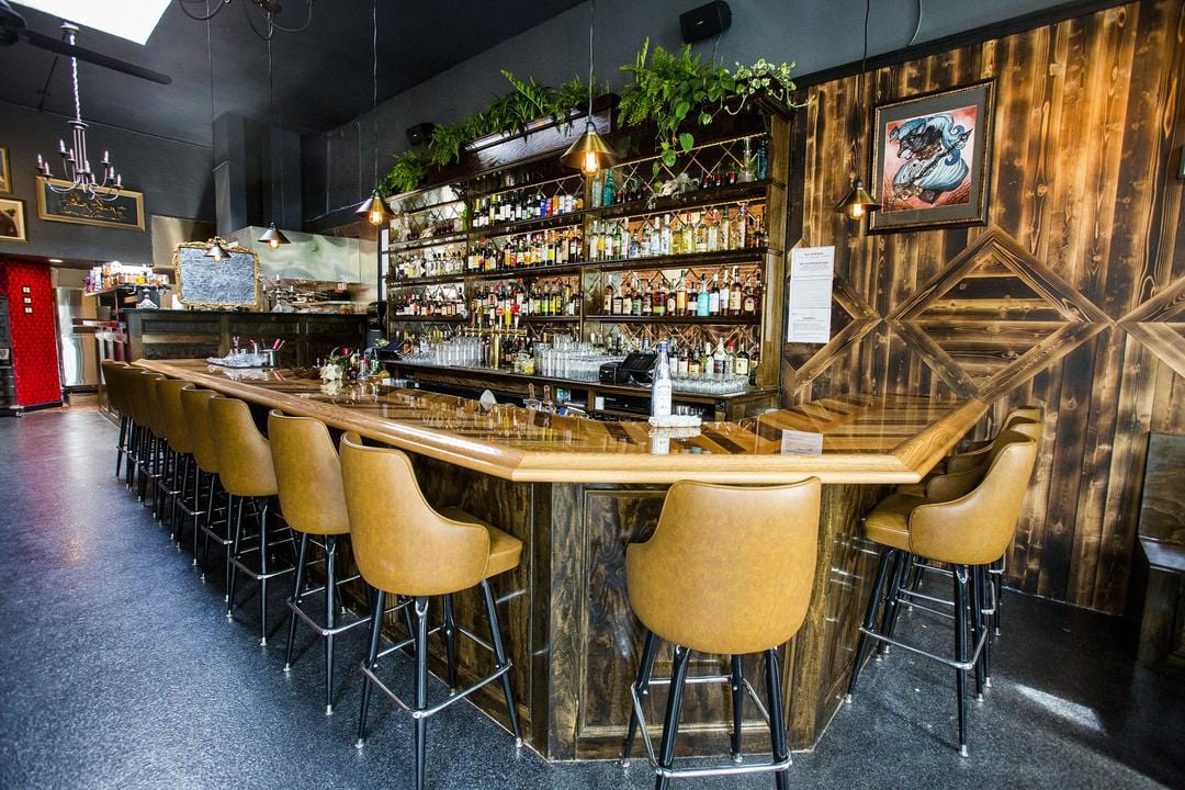 stylish bar with bucket bar stools