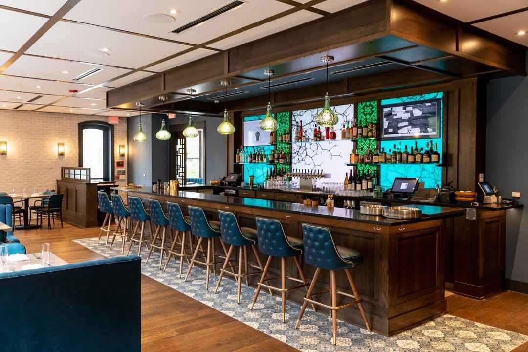 modern bar with tufted button bar stool