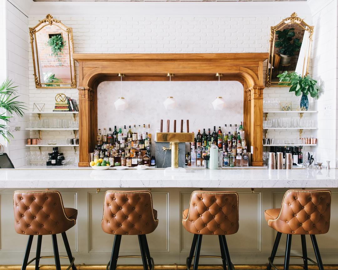 modern bar with tufted button bar stool