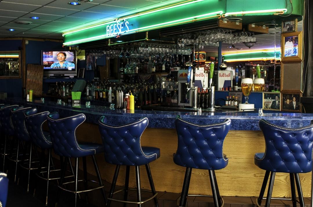 american bar with blue bar stool