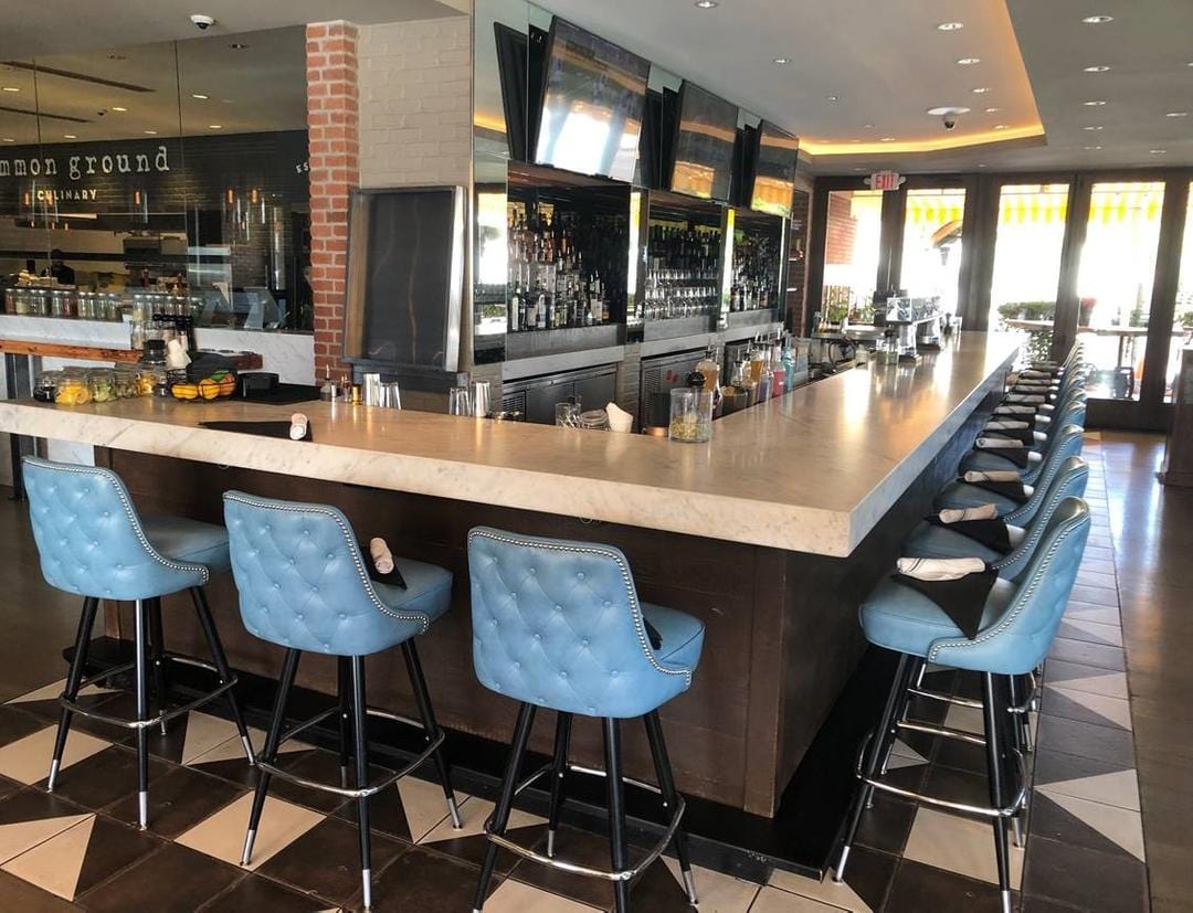 restaurant with light blue counter bar stools