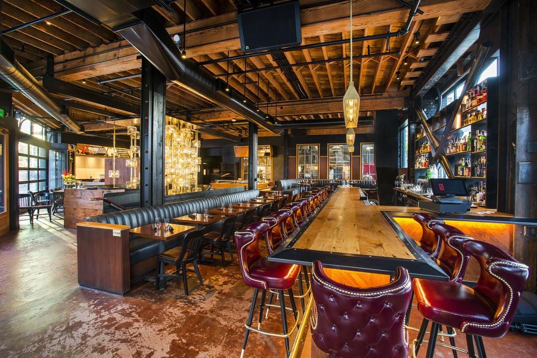 restaurant with tufted button bar stools